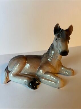 Vintage Red Shed enamel over cast iron door stopper